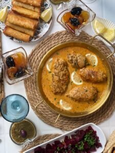 mediterranean feast with meat dish and appetizers