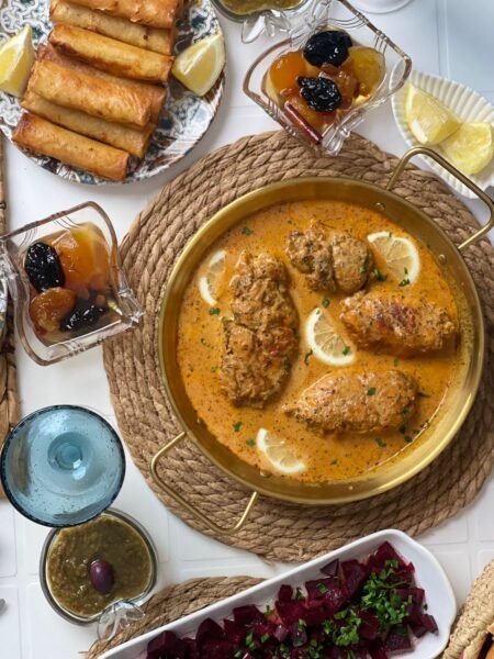 mediterranean feast with meat dish and appetizers