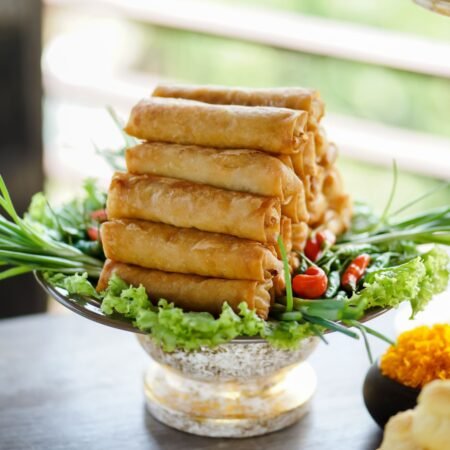 crispy spring rolls platter with fresh garnish